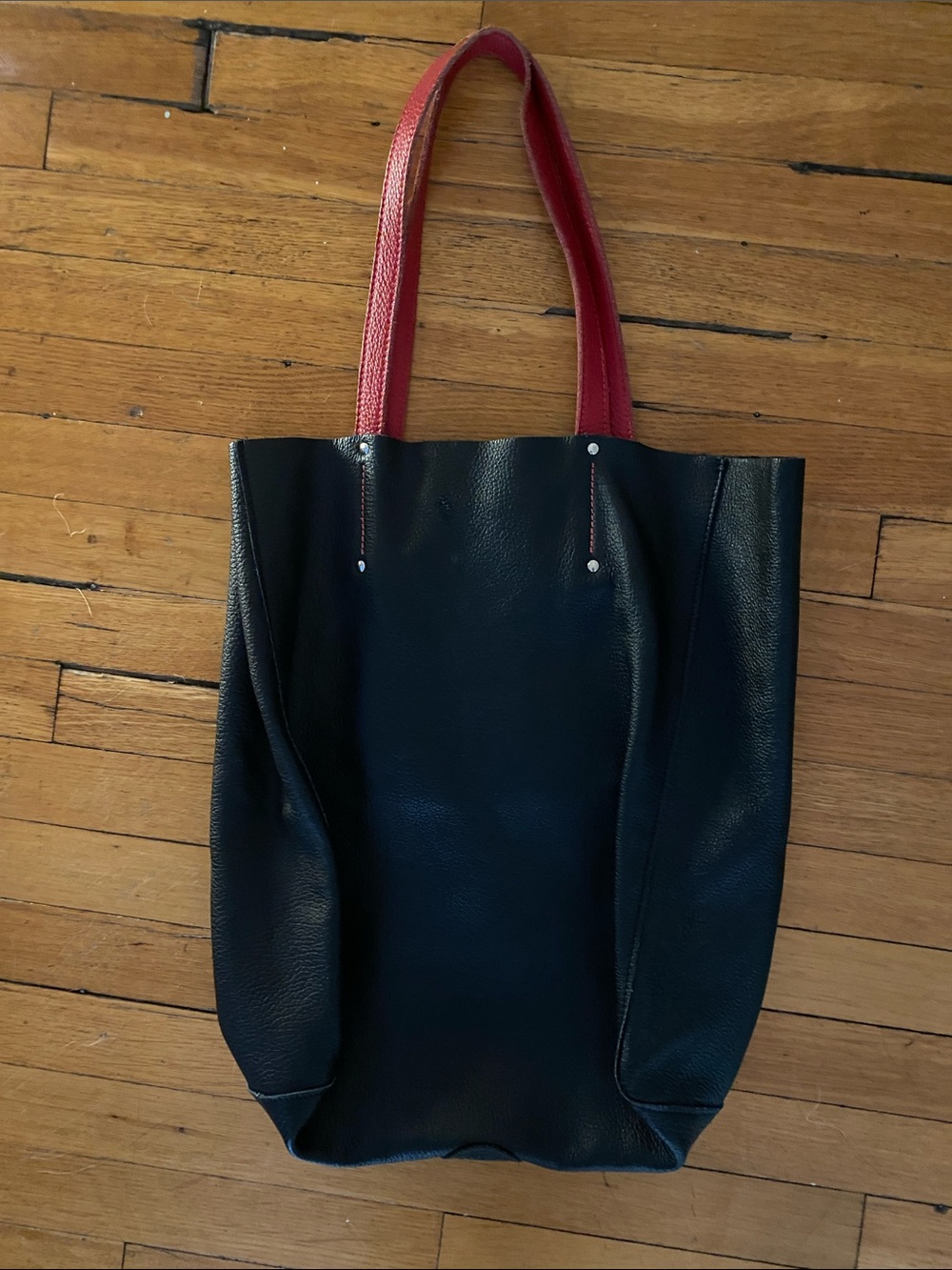 Roots Black Tote Bag with Red Shoulder Straps